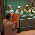 You would see many artists throughout the Louvre drawing / painting.